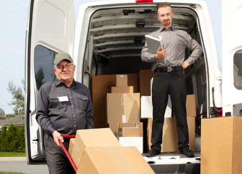Removal team preparing a Soho flat move in a central London street