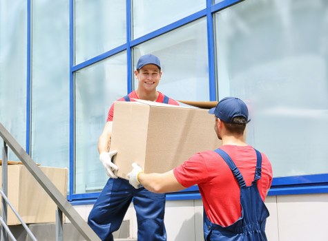 Office furniture removals service in Soho with desks and chairs