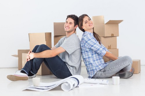 Staff using protective packing and careful handling during a move