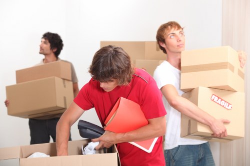 Local moving team preparing furniture and boxes for a Soho business move