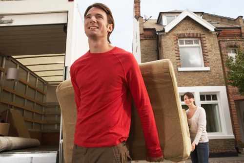 Protective handling of sofas and cabinets during a Soho removal
