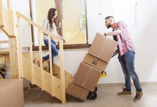 Furniture and boxes being loaded for a Soho relocation