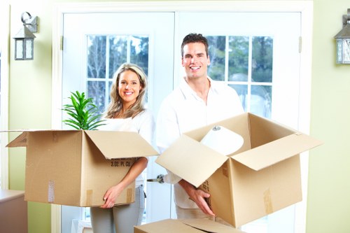 Commercial moving team handling office furniture in Soho